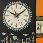 Gauzy Humans Orange Tribal Art Wall Clock